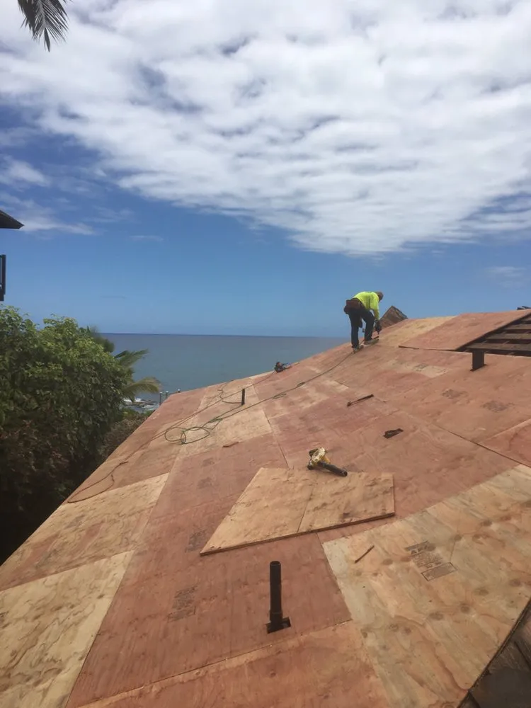 Slide of Valley Isle Roofing