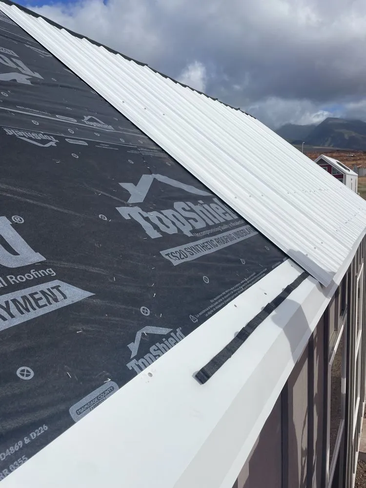 Slide of Valley Isle Roofing