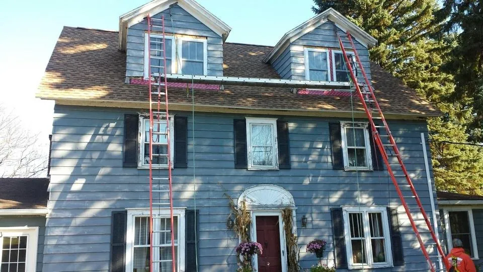 Slide of Van Derhoof Roofing