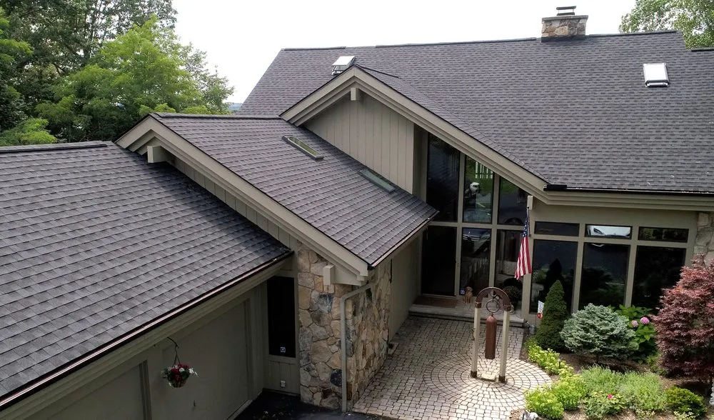 Slide of Van Derhoof Roofing