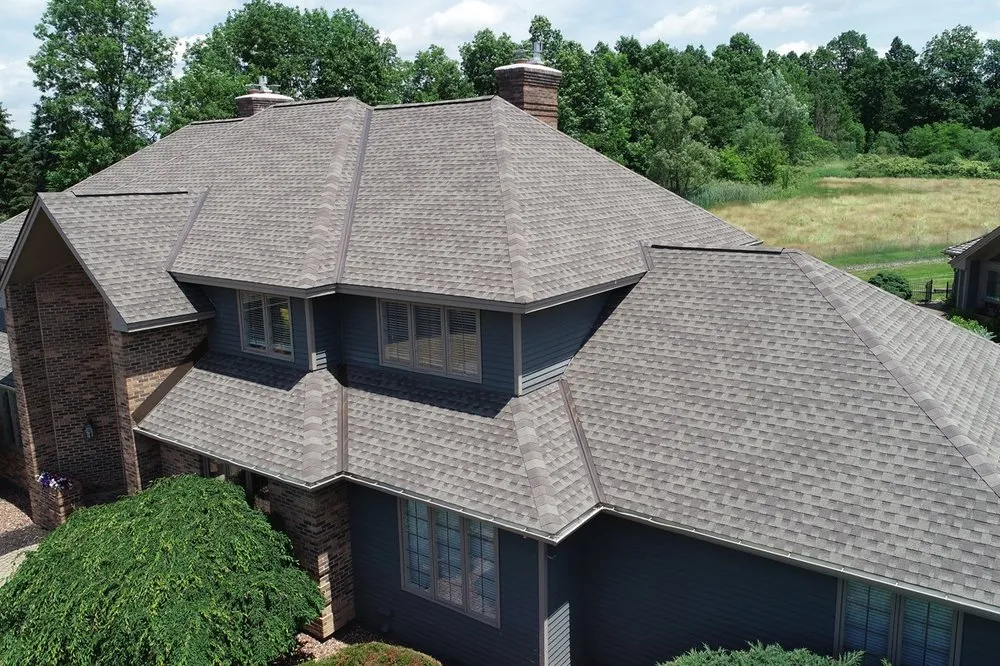 Slide of Van Derhoof Roofing