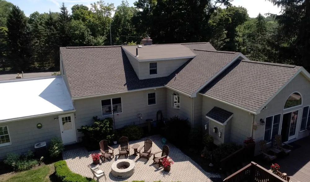 Slide of Van Derhoof Roofing