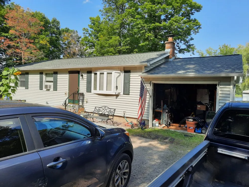 Slide of Van Derhoof Roofing