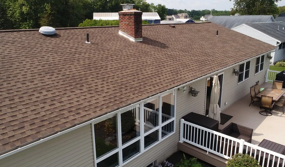 Slide of Van Derhoof Roofing