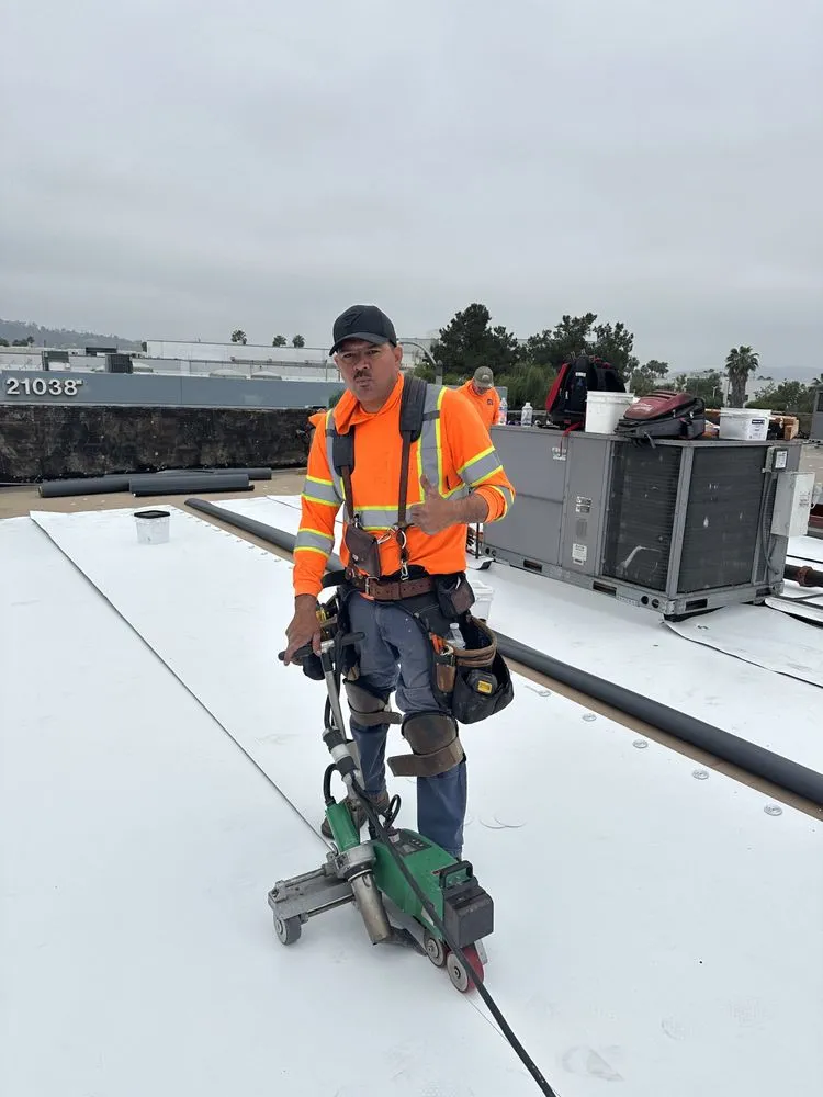 Slide of Van Lund Roofing and Solar