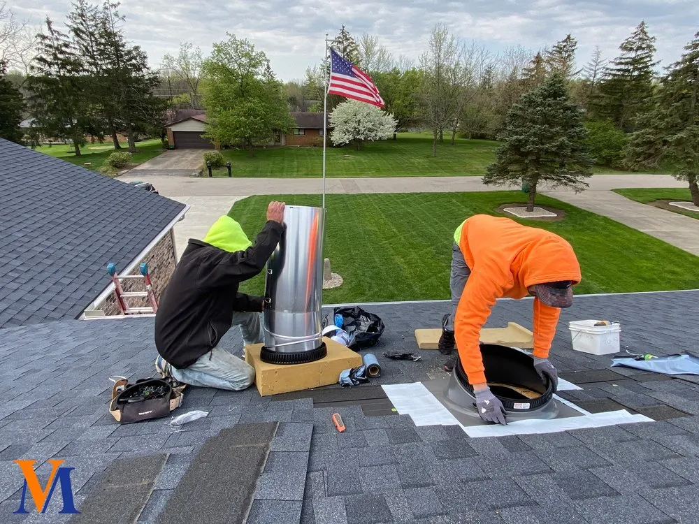 Slide of Van Martin Roofing - Mason