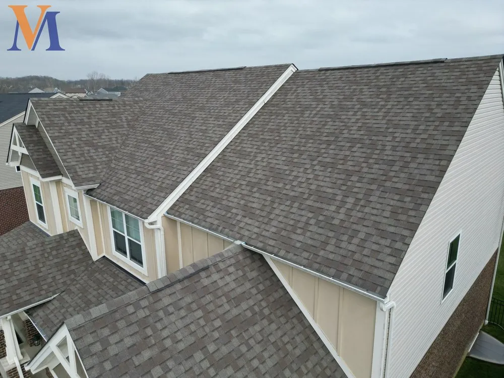 Slide of Van Martin Roofing - Mason