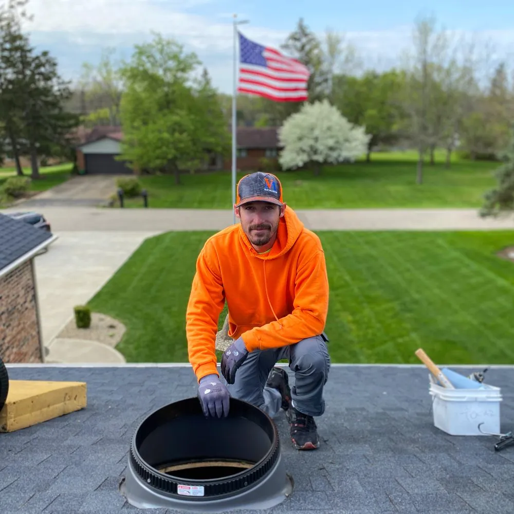 Slide of Van Martin Roofing Centerville