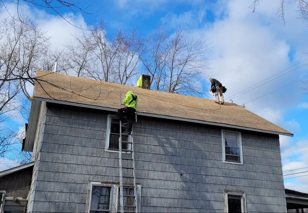 Slide of VANBECKS Roofing and Siding
