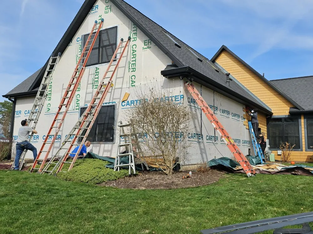 Slide of VANBECKS Roofing and Siding