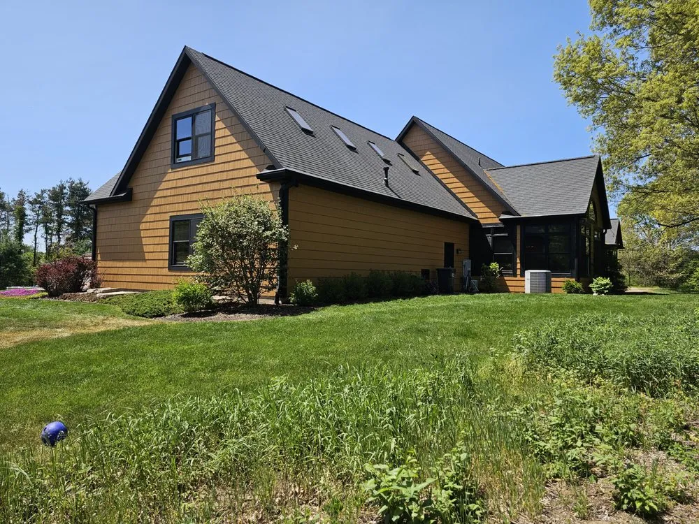 Slide of VANBECKS Roofing and Siding