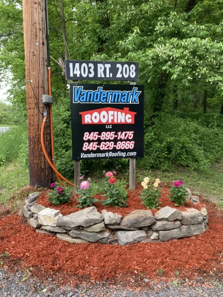 Slide of Vandermark Roofing
