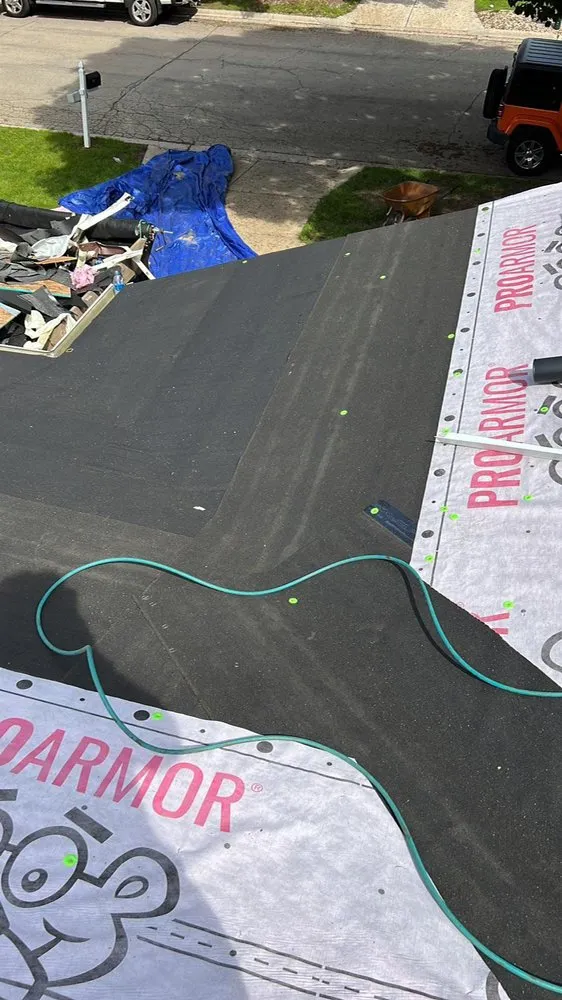 Slide of Vanguard Roofing & Siding