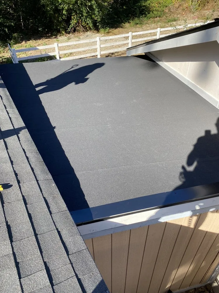 Slide of Vanguard Roofing LLC