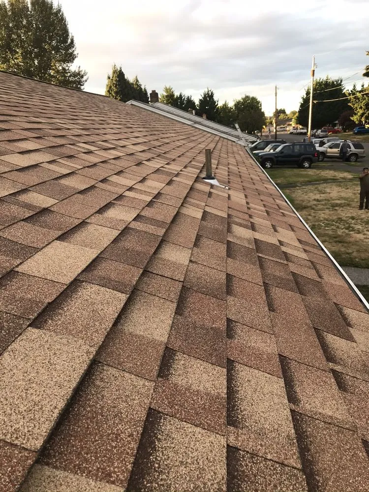 Slide of Vanguard Roofing LLC