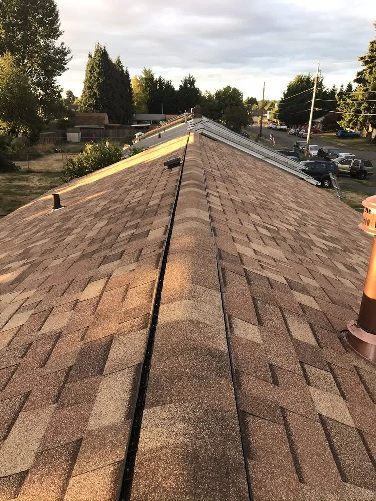 Slide of Vanguard Roofing LLC