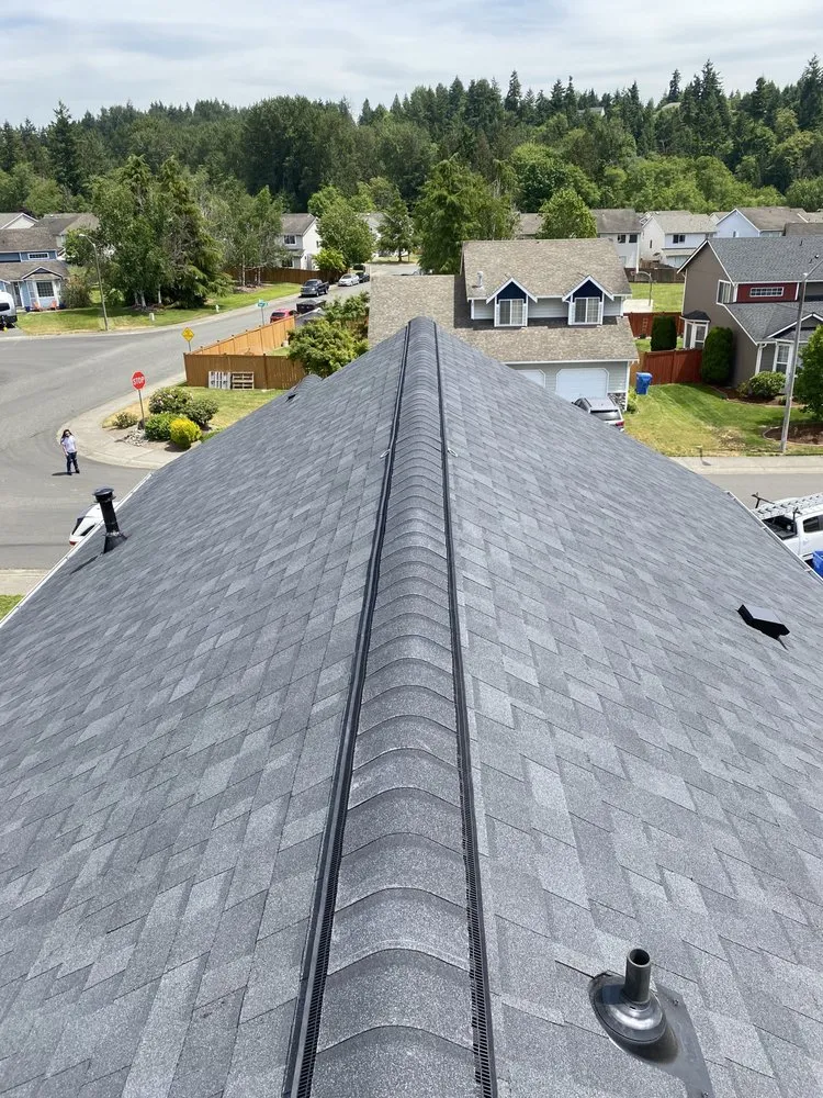 Slide of Vanguard Roofing LLC