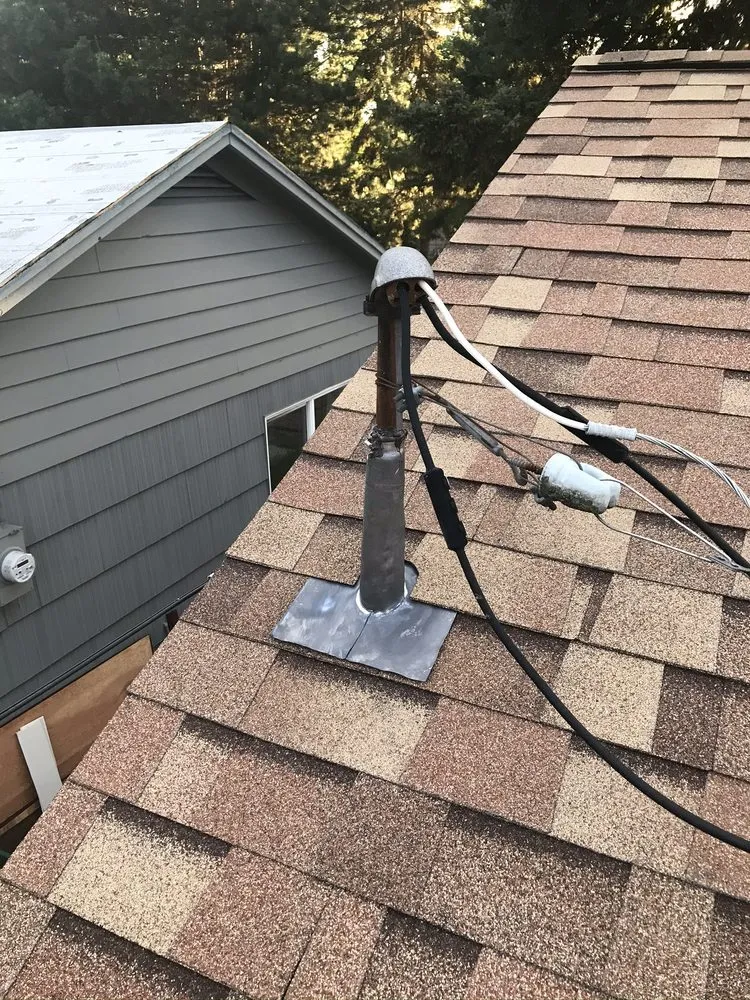 Slide of Vanguard Roofing LLC