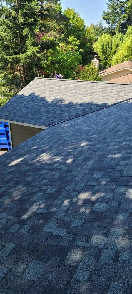 Slide of Vanguard Roofing LLC