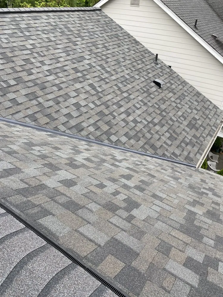 Slide of Vanguard Roofing LLC