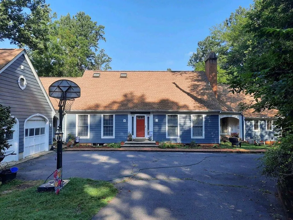 Licensed storm damage roof repair after storm damage in Madison, VA by Vanguard Roofing