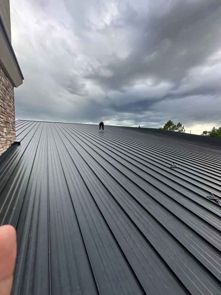 Slide of Vanguard Roofing