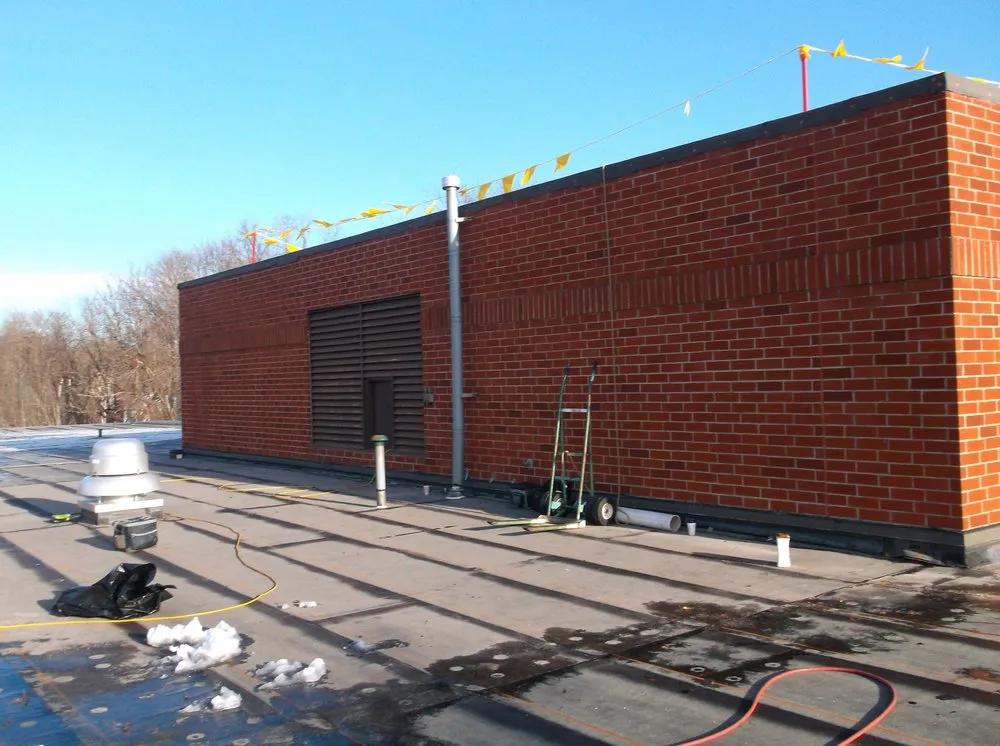 Slide of Vanguard Roofing