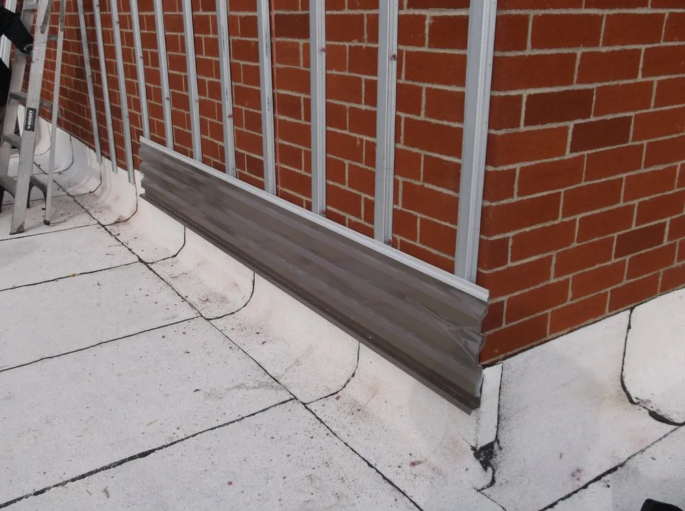 Slide of Vanguard Roofing