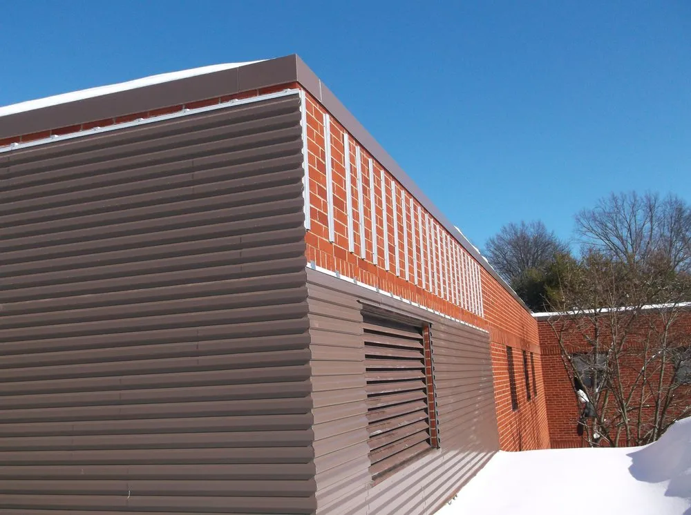 Slide of Vanguard Roofing