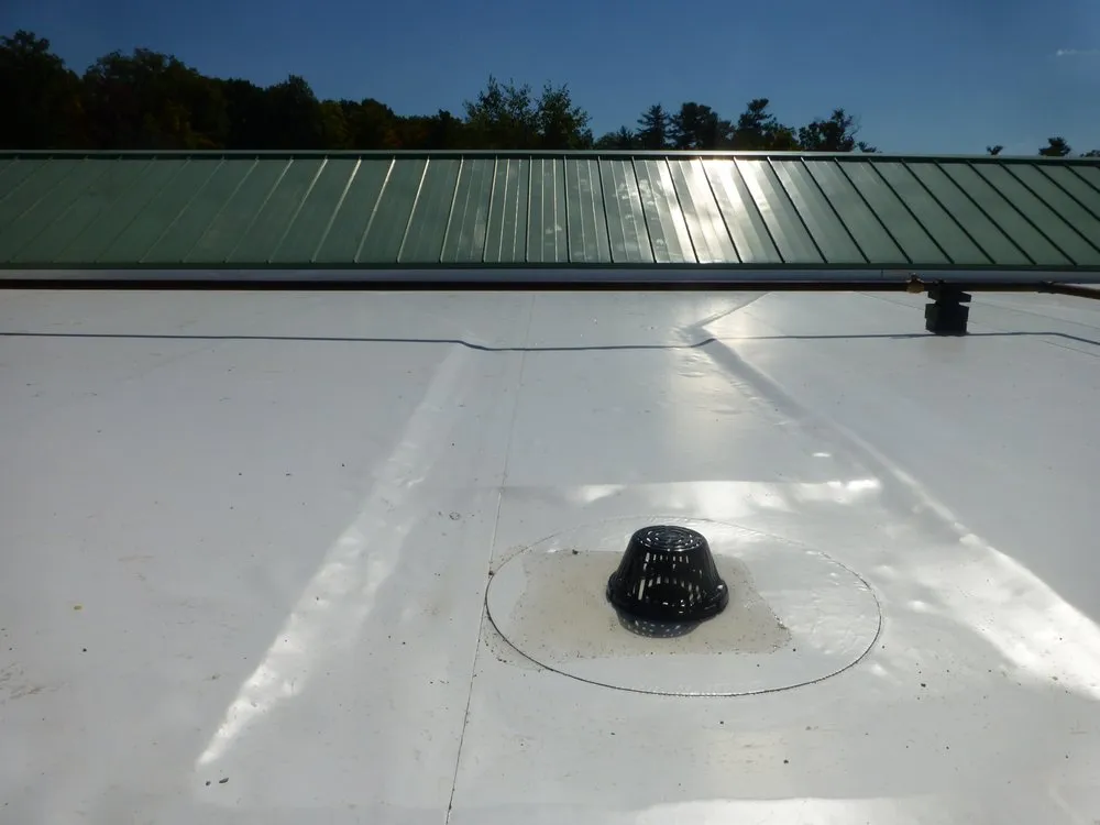 Slide of Vanguard Roofing