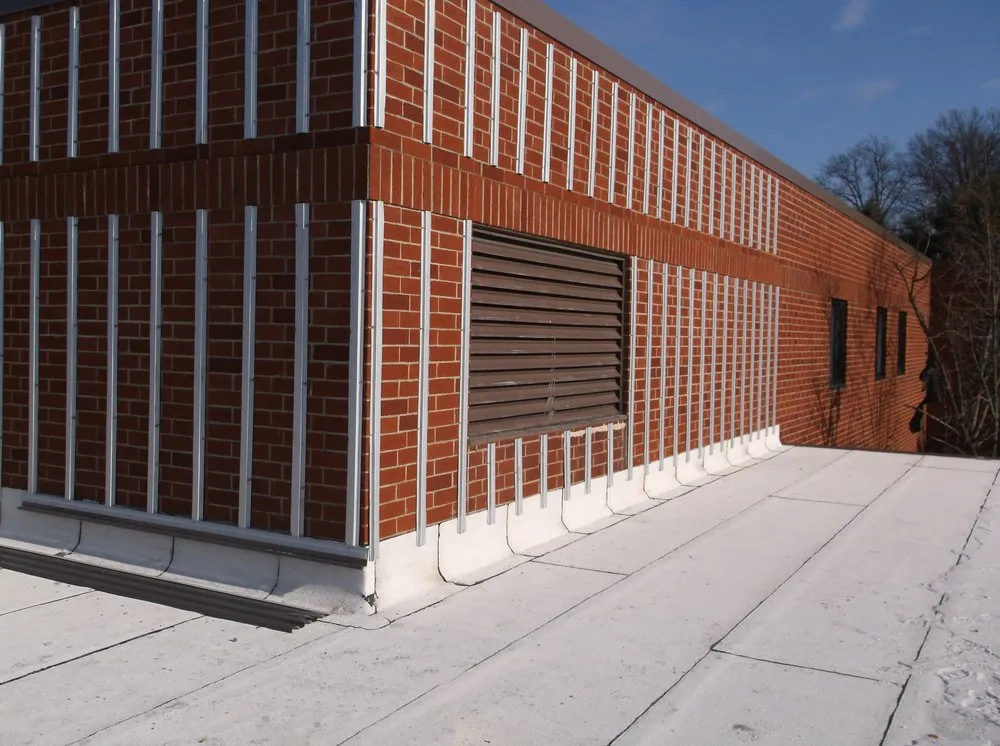 Slide of Vanguard Roofing