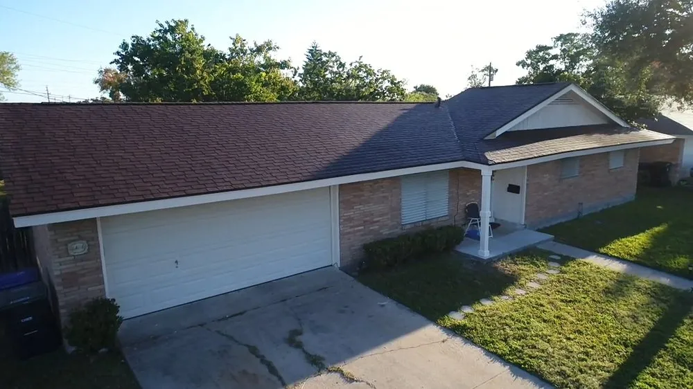 Slide of Vasquez Roofing Company