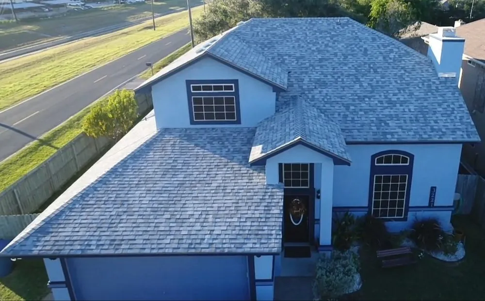 Slide of Vasquez Roofing Company