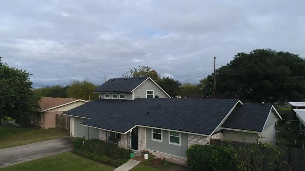 Slide of Vasquez Roofing Company