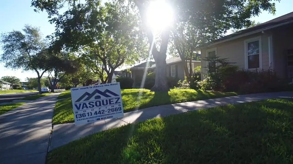 Slide of Vasquez Roofing Company