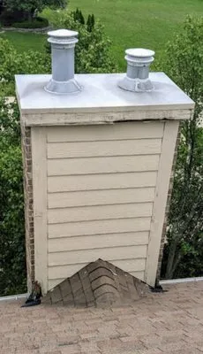 Vaughn Home Improvement Co Logo