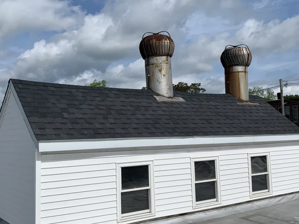 Slide of V&C Roofing