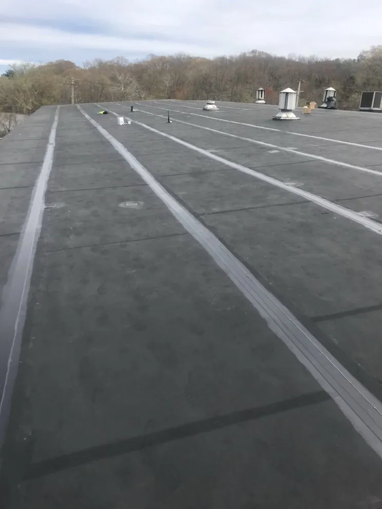 Slide of V&C Roofing