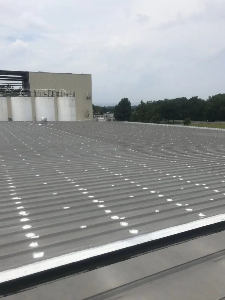 Slide of V&C Roofing