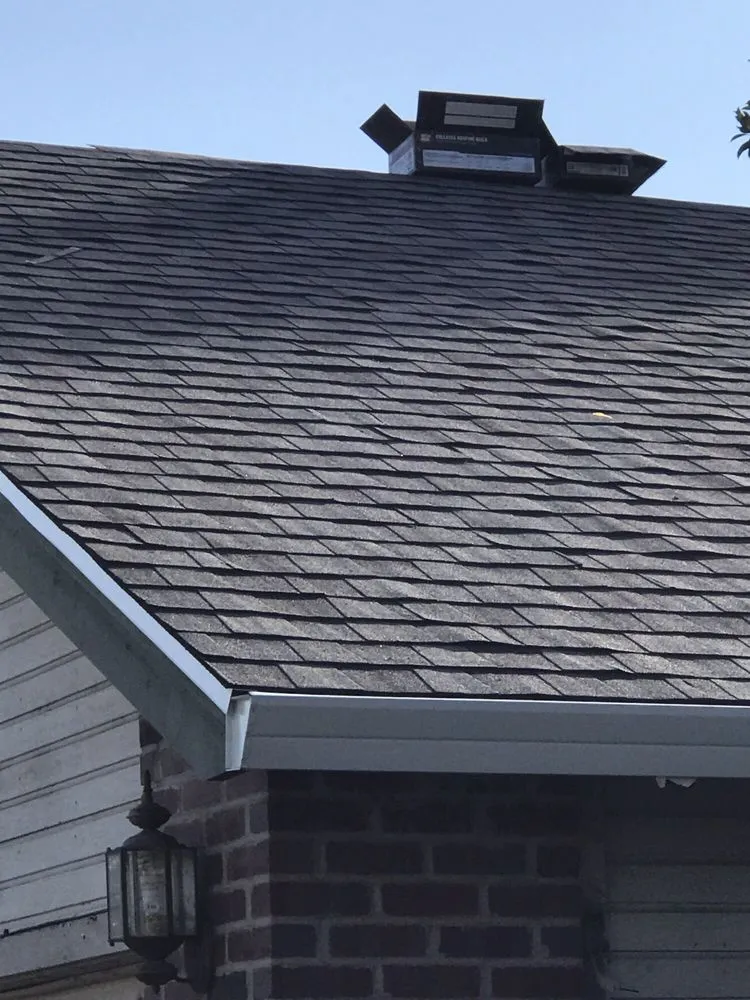 Slide of Ved's Roofing