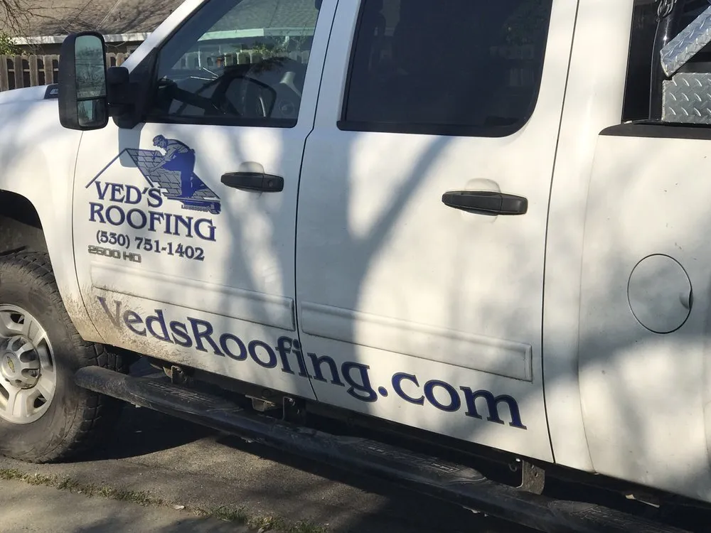 Slide of Ved's Roofing