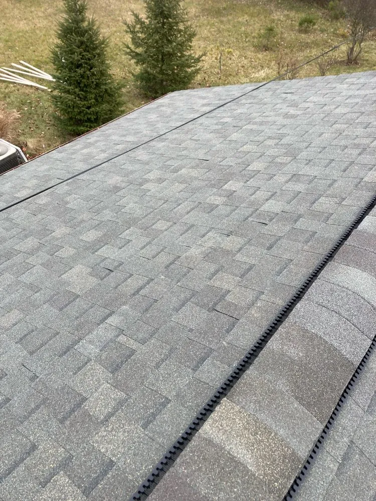 Slide of Veenkamp Roofing & Siding