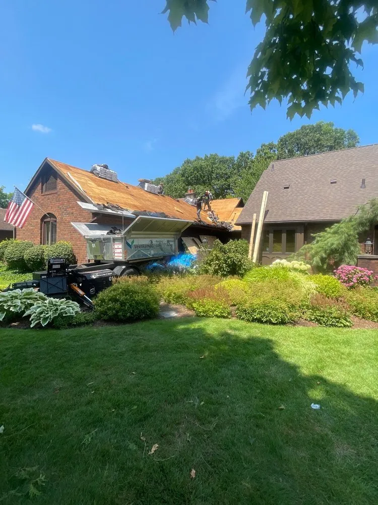 Slide of Veenkamp Roofing & Siding