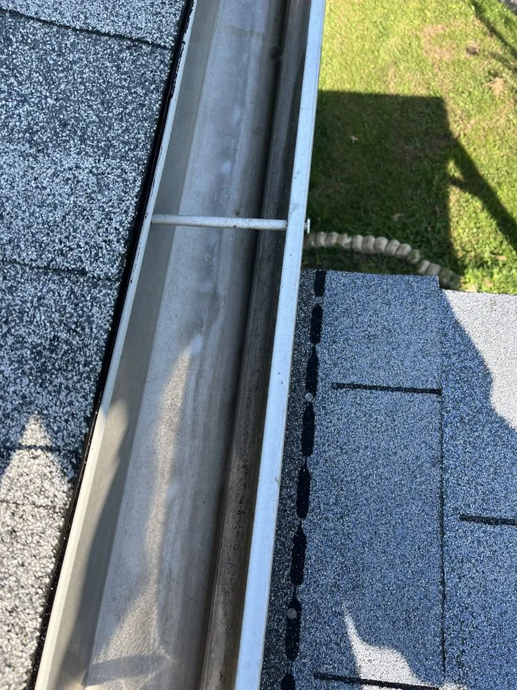 Slide of Vega and Sons Gutter and Roof Services
