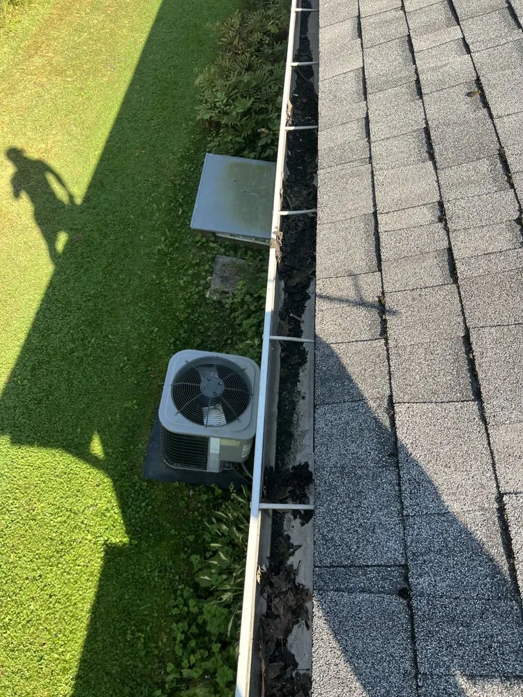 Slide of Vega and Sons Gutter and Roof Services