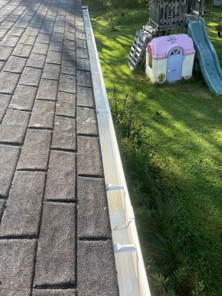 Slide of Vega and Sons Gutter and Roof Services