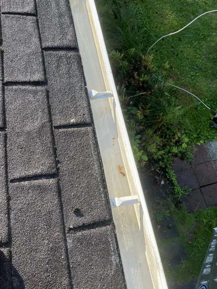 Slide of Vega and Sons Gutter and Roof Services