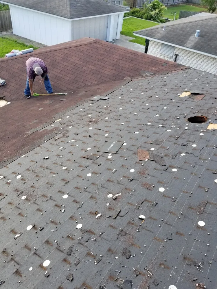 Slide of Vela's Roofing and Construction