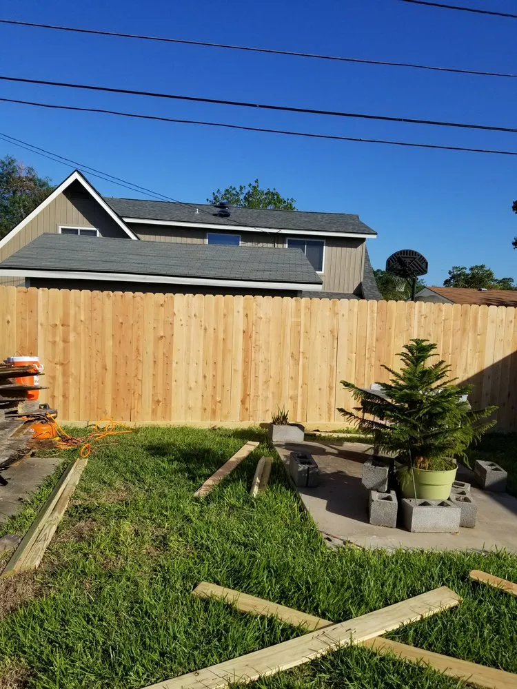 Slide of Vela's Roofing and Construction