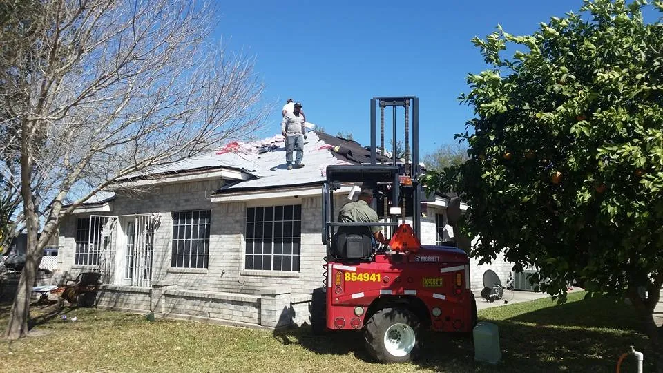 Slide of Vela's Roofing and Construction